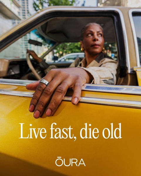 A woman drives a vintage car with her hand resting on the door, showing off a minimalist smart ring, paired with a bold, contrasting headline.